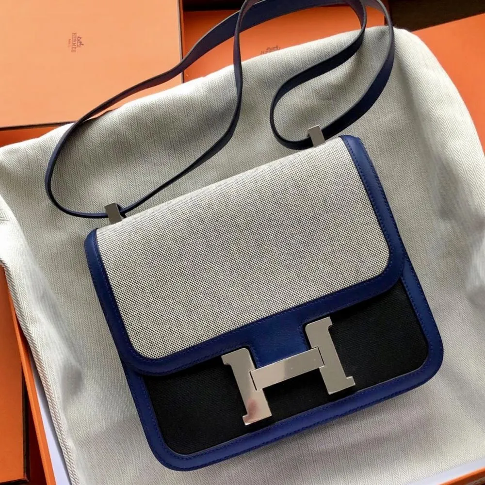 Hermès Constance 24 Noir (Black)/Bleu Saphir Berline Veau Swift Toile Palladium Hardware PHW