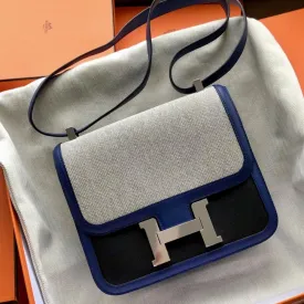 Hermès Constance 24 Noir (Black)/Bleu Saphir Berline Veau Swift Toile Palladium Hardware PHW