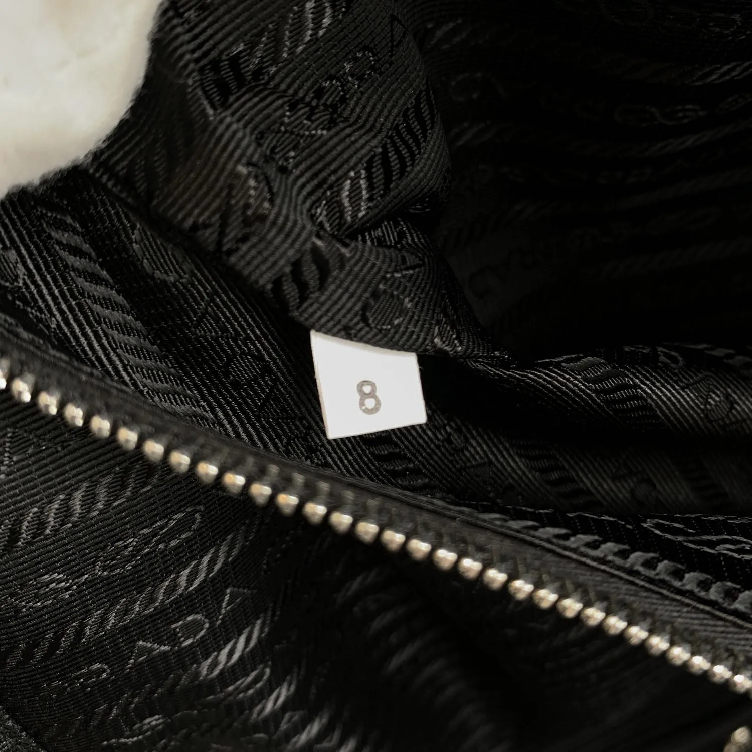 Prada Luggage Re-Nylon